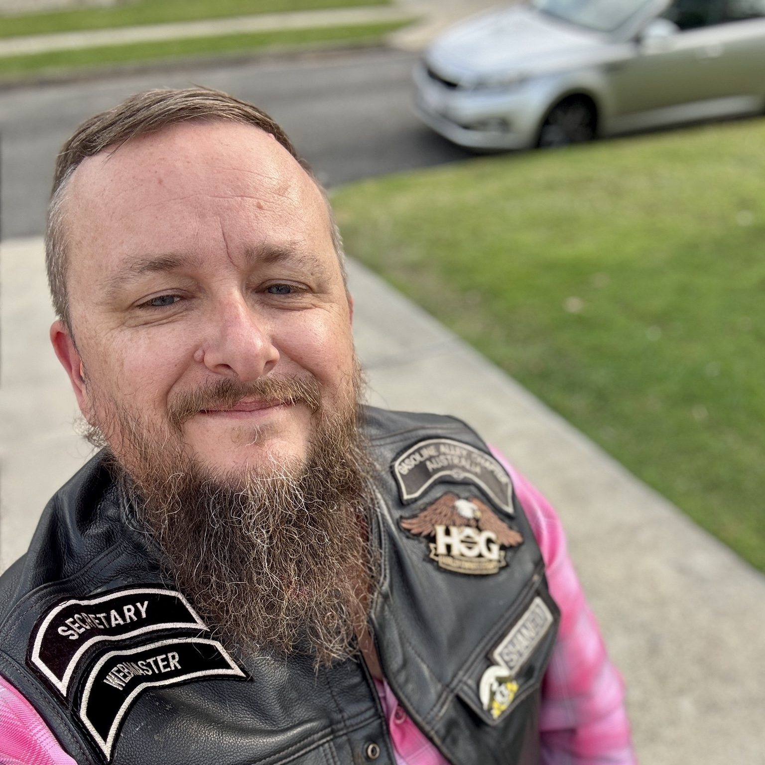 Shane wearing pink for the June Ladies of Harley ride