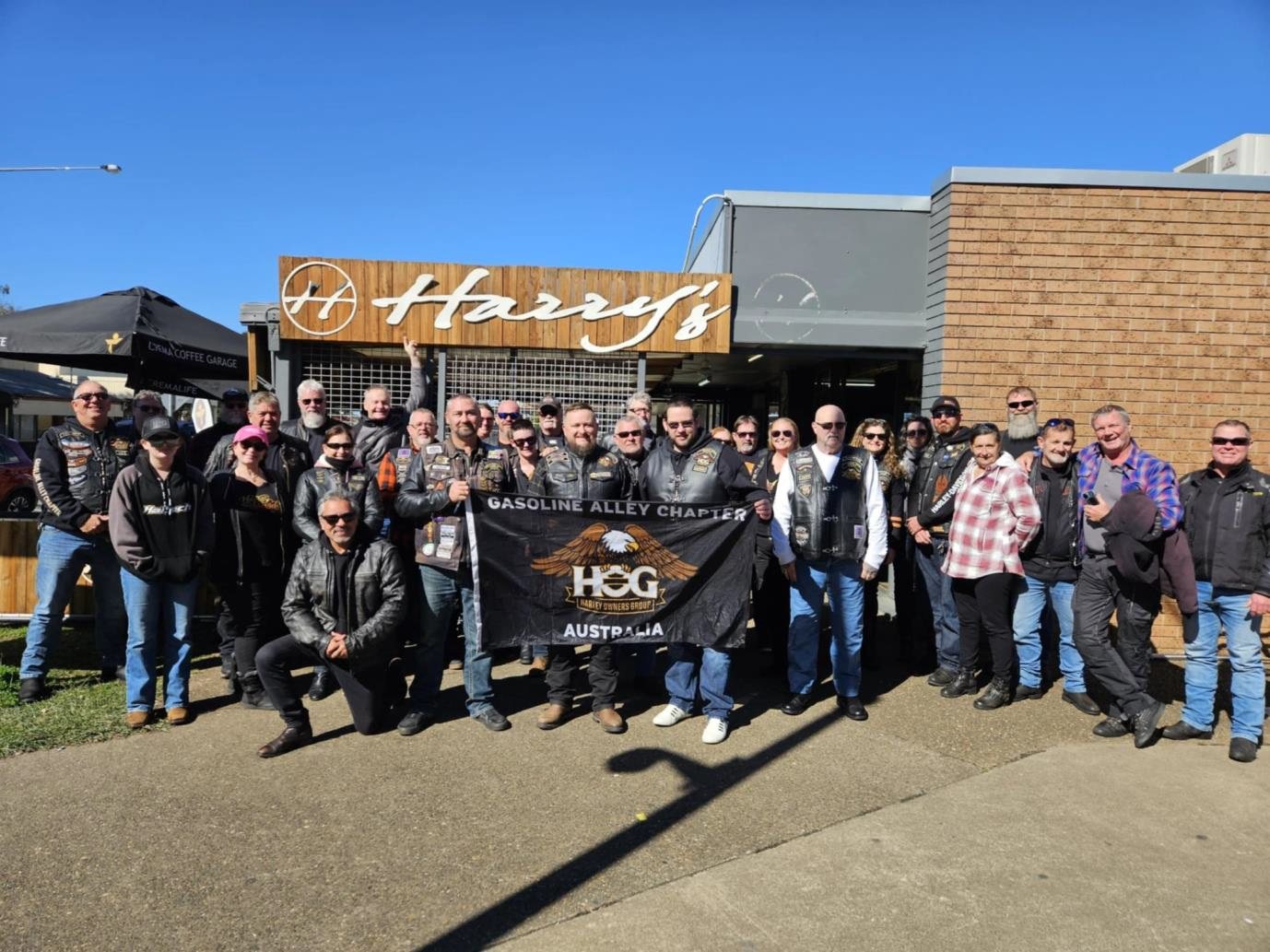Gasoline Alley Chapter group outside Harry's Place Café during the Rosewood Double Shot